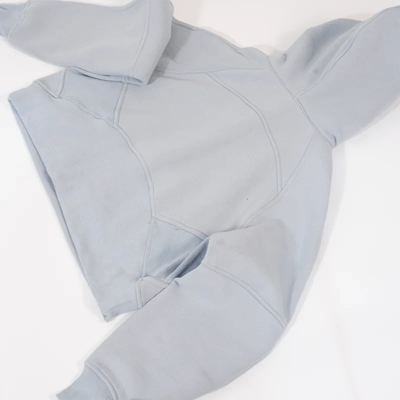 Premium women's sports fleece hoodie with half zip, available in a range of sophisticated colours