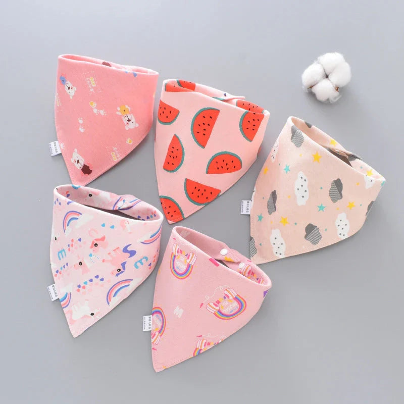 Stylish cotton baby bandana bibs in various fashionable prints, designed to keep your little one dry and comfortable.