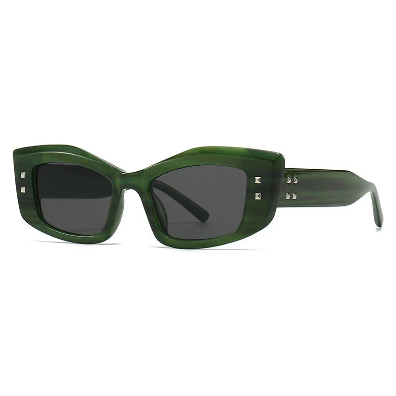 Retro cat eye sunglasses with rivet details, offering a stylish and protective eyewear solution.