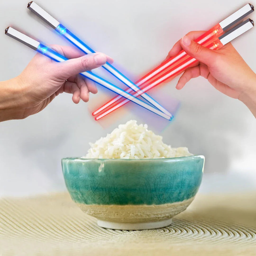 Pair of LED-illuminated Lightsaber Chopsticks, perfect for Star Wars-themed dining and adding a touch of magic to any meal
