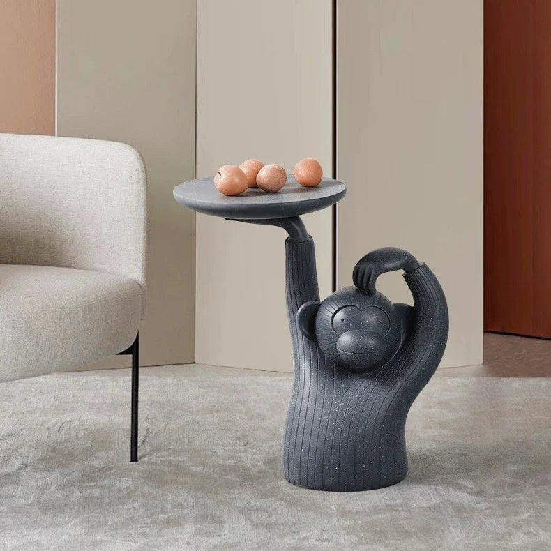 Decorative monkey-inspired resin coffee table tray in light grey or dark grey colour, suitable for serving, display, or as a living room accent piece.