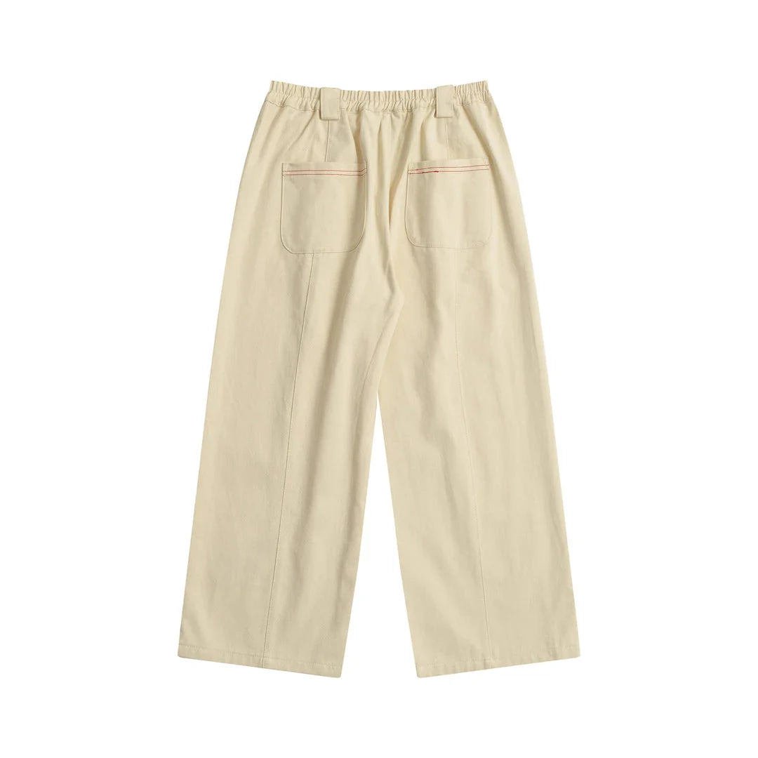Women's high-waist cotton capri trousers with embroidered fruit designs in a relaxed straight-leg fit