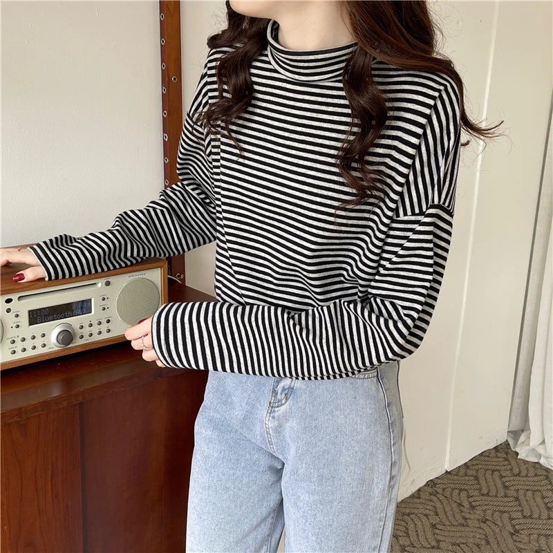 Premium half-high neck striped long-sleeve t-shirt in grey and black, made with high-quality British cotton for ultimate comfort and style.