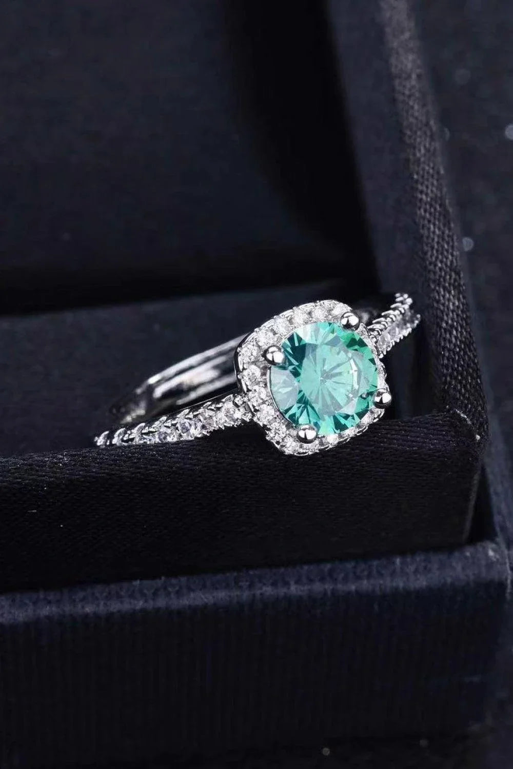 Sparkling 3 carat moissanite platinum-coated cluster ring with modern, minimalist design and polished finish
