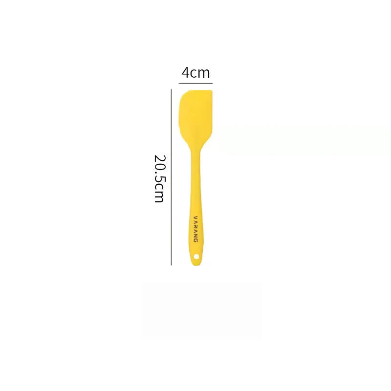 A set of two high-quality silicone spatulas in brown and yellow colours, designed for versatile cooking and baking tasks.