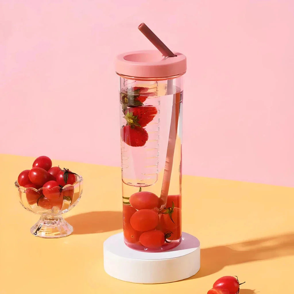 A transparent 700ml drinking bottle with a straw and built-in lemon filter, perfect for staying hydrated on the go.