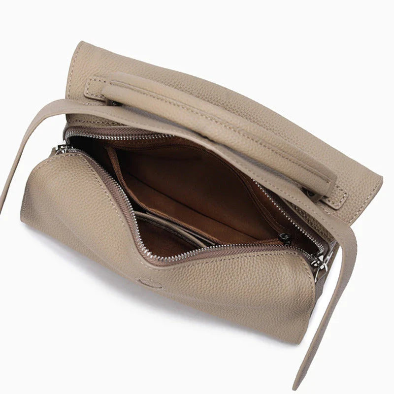 Premium British cowhide leather shoulder bag with multiple interior pockets and adjustable strap for versatile wear