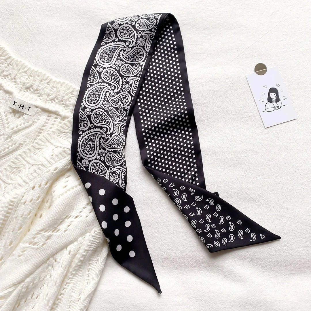 Luxury silk-feel narrow scarf in blue colour, a versatile fashion accessory for the modern British woman