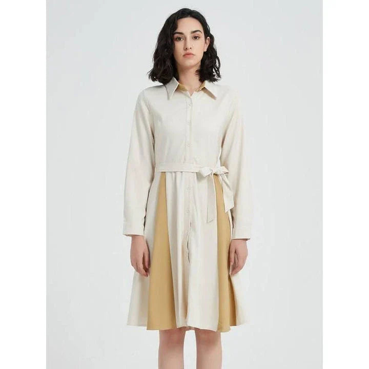 Elegant beige A-line dress with long sleeves, turn-down collar, and included belt for a flattering fit