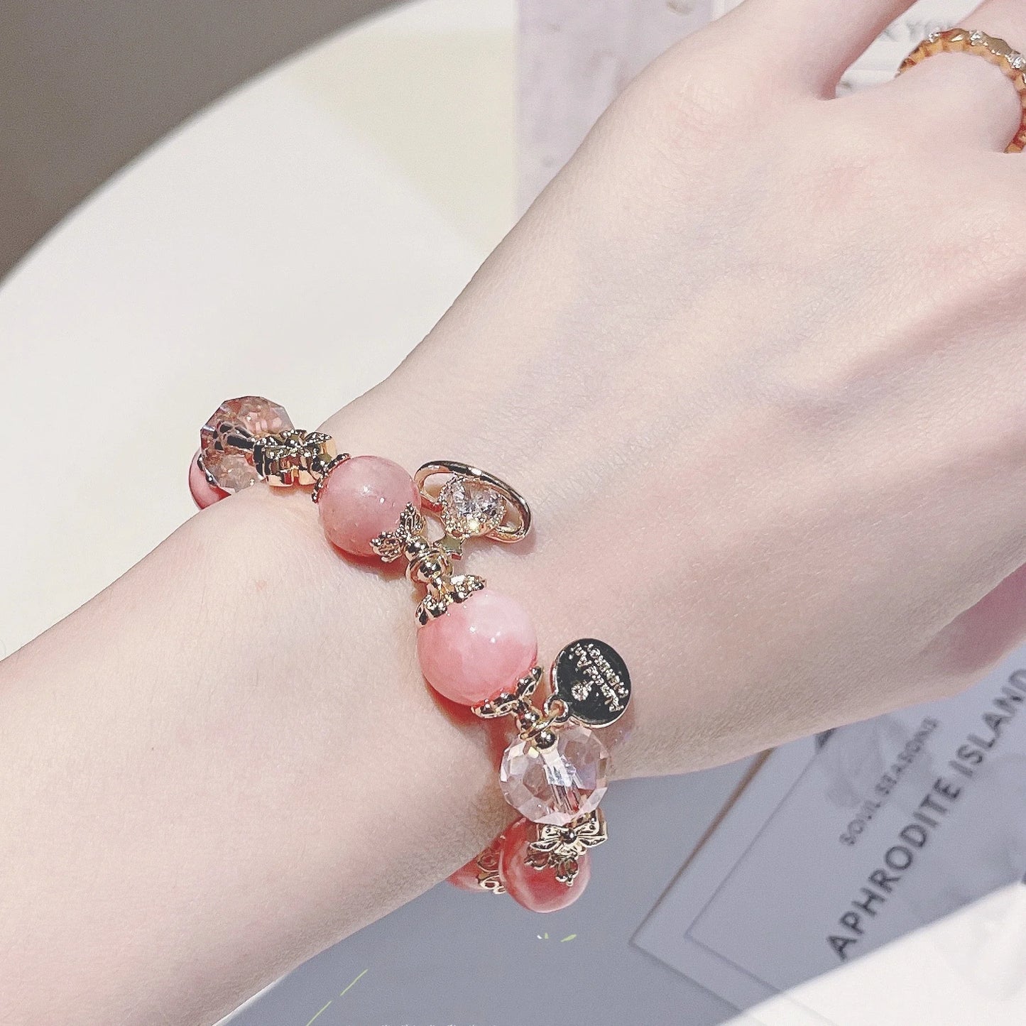 Stylish cream agate crystal bracelet with captivating Star of Peach design, available in S and M sizes for fashion-conscious British women