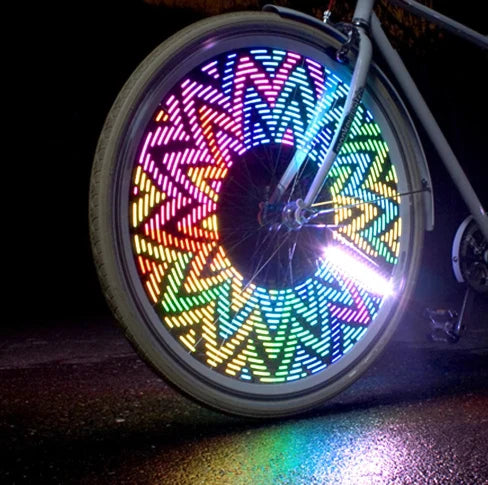 Bicycle Wheel Flashing Light with 32 LED lights in red, blue, and green colours that create a mesmerizing light show