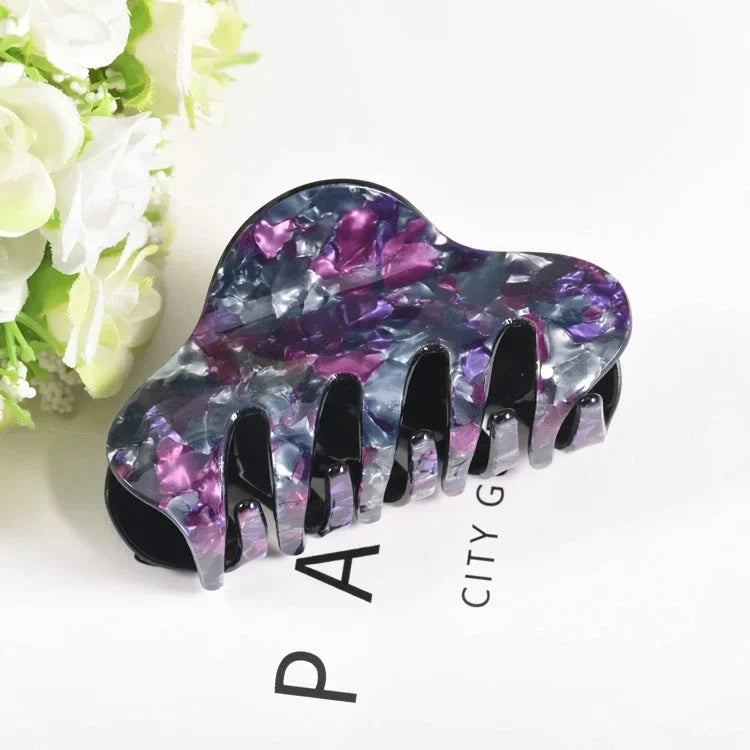 Elegant large floral acrylic hair clips in various colours for a sophisticated look