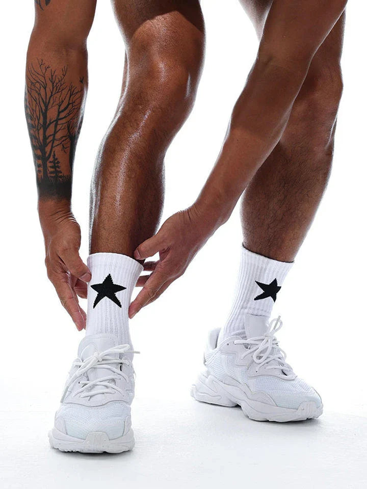 Premium white sports socks with a five-pointed star pattern, designed for men's active lifestyles.