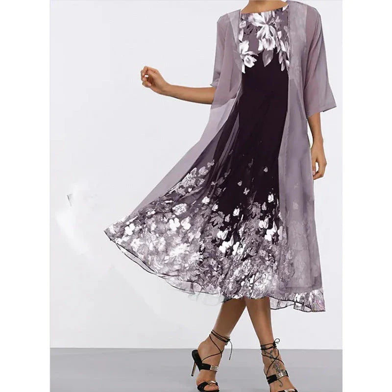 A stylish, multi-colour long dress made from high-quality chiffon fabric, featuring a comfortable swing skirt and versatile 3/4 sleeves.