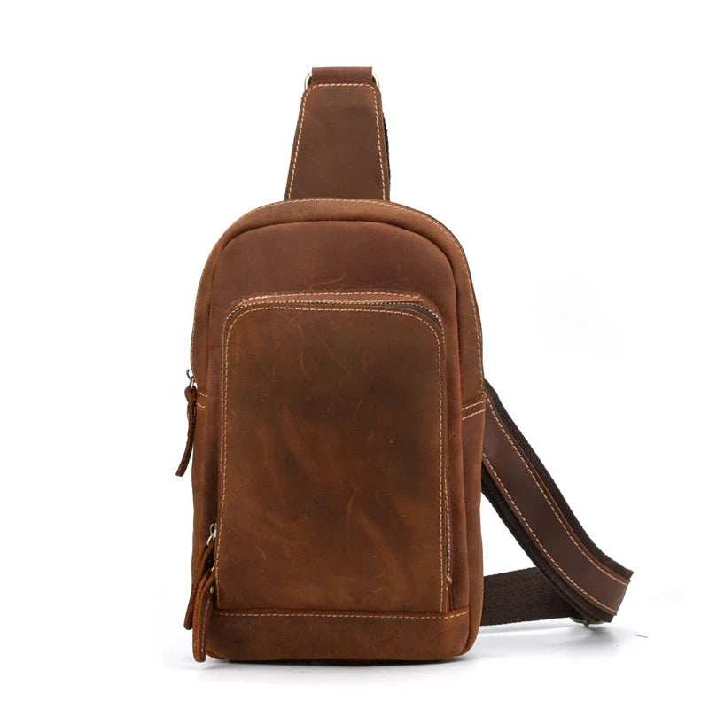 Vintage-inspired genuine leather briefcase with multiple compartments and secure zipper closure, ideal for modern commuters