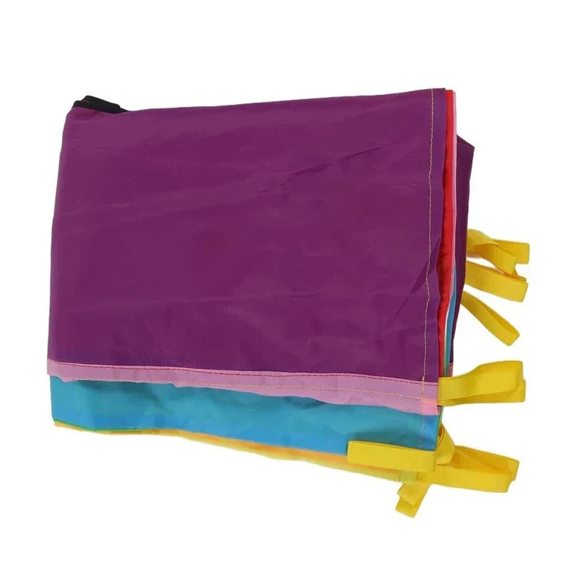 Vibrant rainbow-coloured parachute umbrella game for outdoor group activities and events