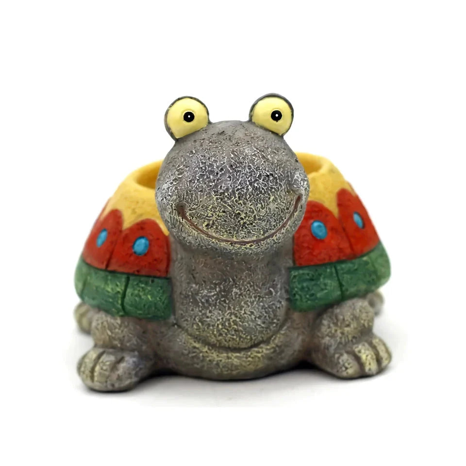 A charming, hand-painted resin planter in the shape of a cartoon turtle, perfect for displaying succulents, cacti, and other small plants.