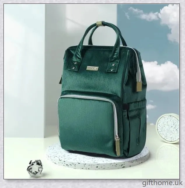 Premium polyester nappy backpack with multiple pockets and adjustable straps, perfect for modern British parents