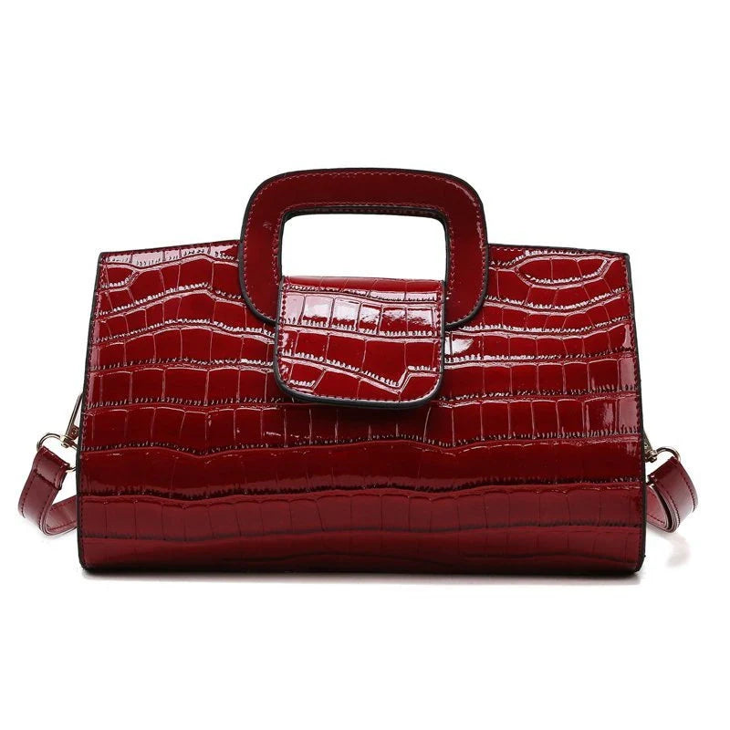 A stylish and versatile retro-patterned handbag with a sturdy canvas construction and organised interior, perfect for everyday use in the UK.