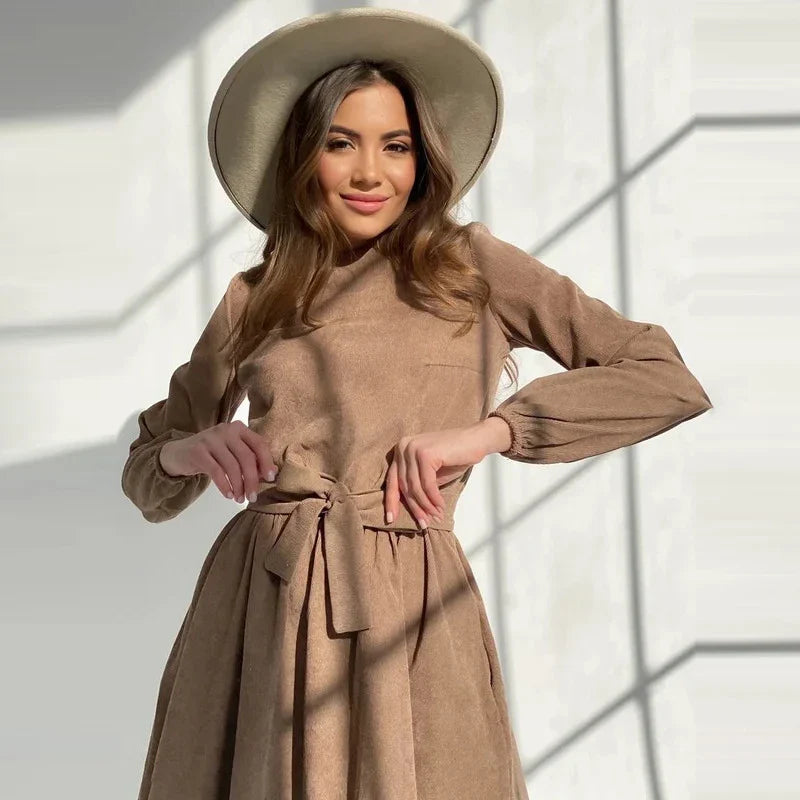Stylish cotton pullover dress with versatile skirt-like design, perfect for the British commuter