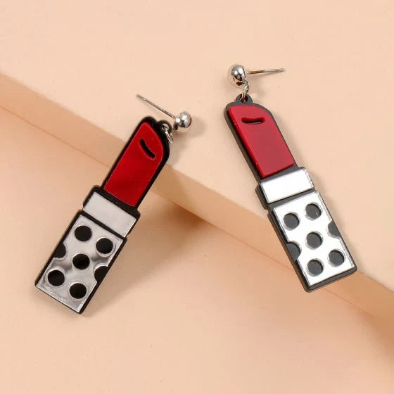Trendha Red Lipstick Earrings: Striking resin earrings in a bold lipstick design, perfect for adding a touch of modern flair to any outfit.
