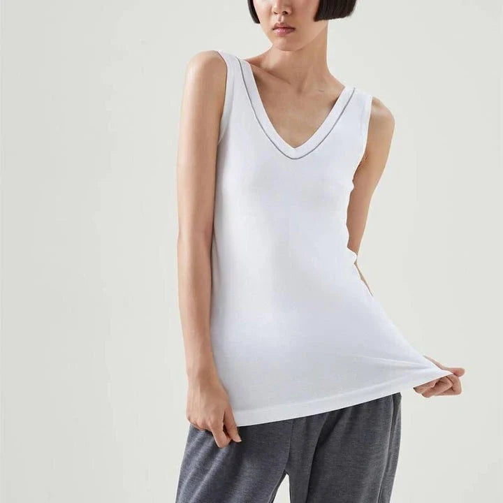 100% wool sleeveless knit vest with delicate beading, available in white colour and multiple sizes