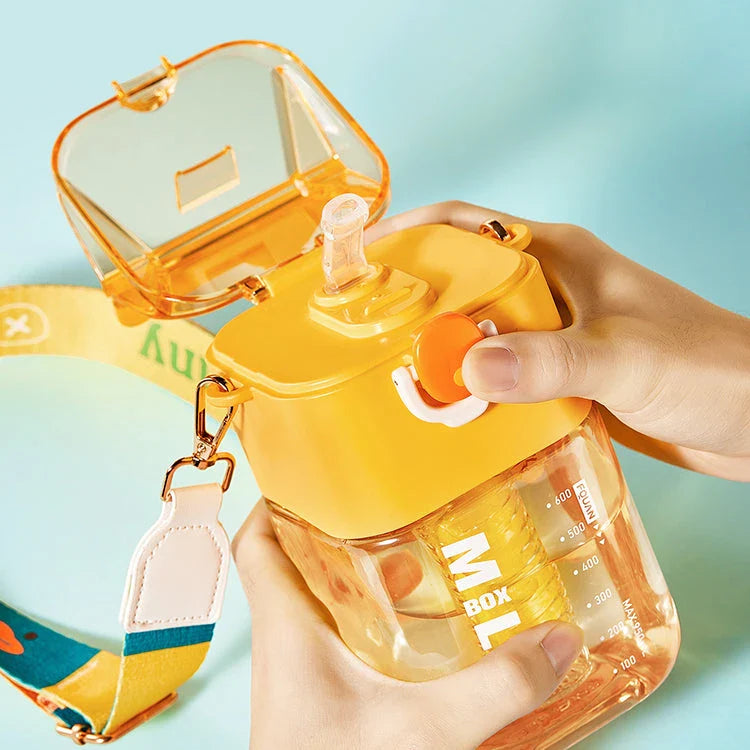 Charming cartoon-themed reusable plastic cup with straw and tea infuser, perfect for daily hydration and on-the-go use