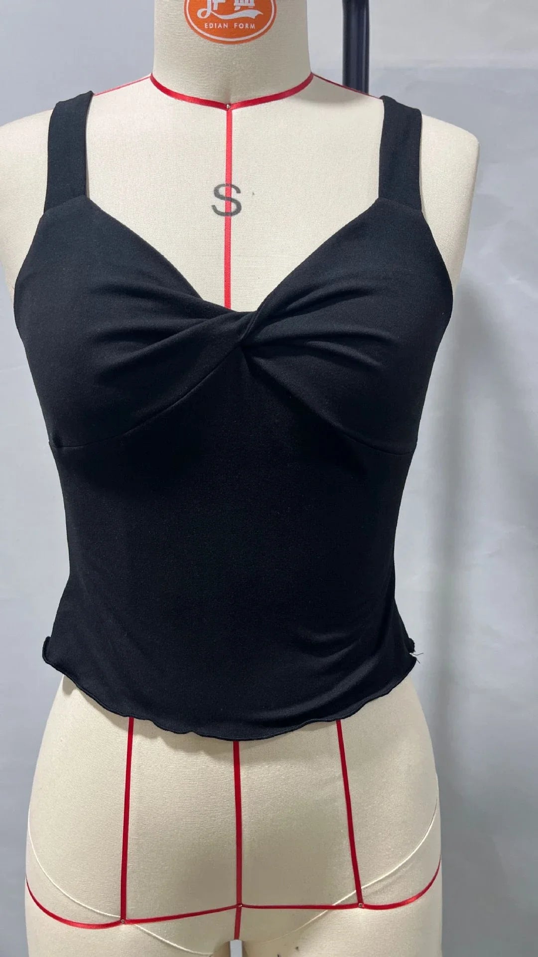A versatile v-neck camisole top in a modern Y2K style, perfect for summer wear in the UK.