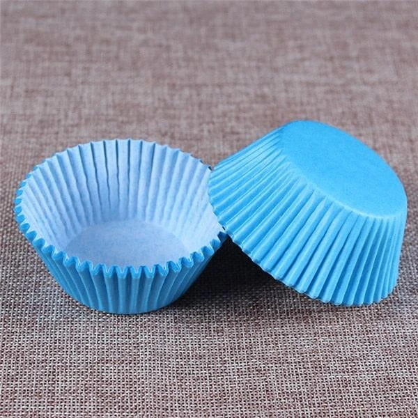 Premium British-made paper cupcake liners in a mixed colour pack, perfect for baking delicious treats at home