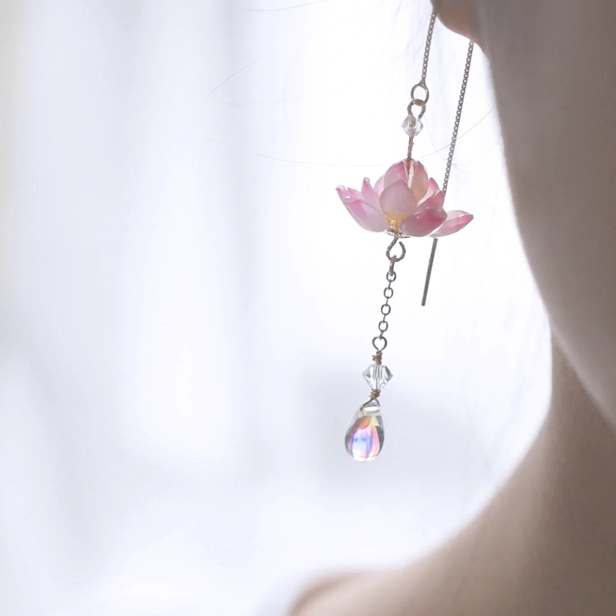 Elegant sterling silver ear clip with a lotus flower design, inspired by traditional Hanfu fashion