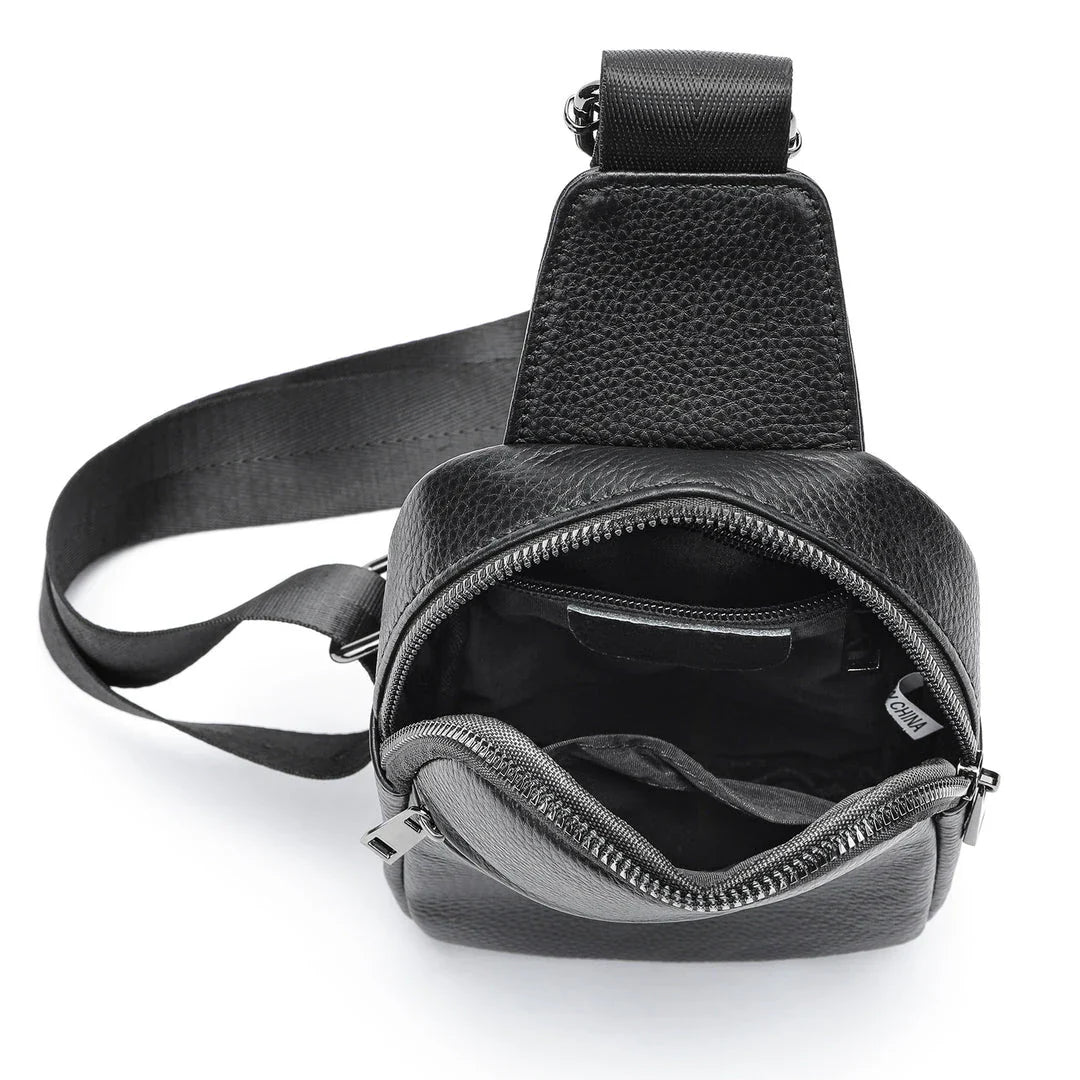 A premium genuine leather crossbody bag with an urban, minimalist design, perfect for everyday use and outdoor adventures.