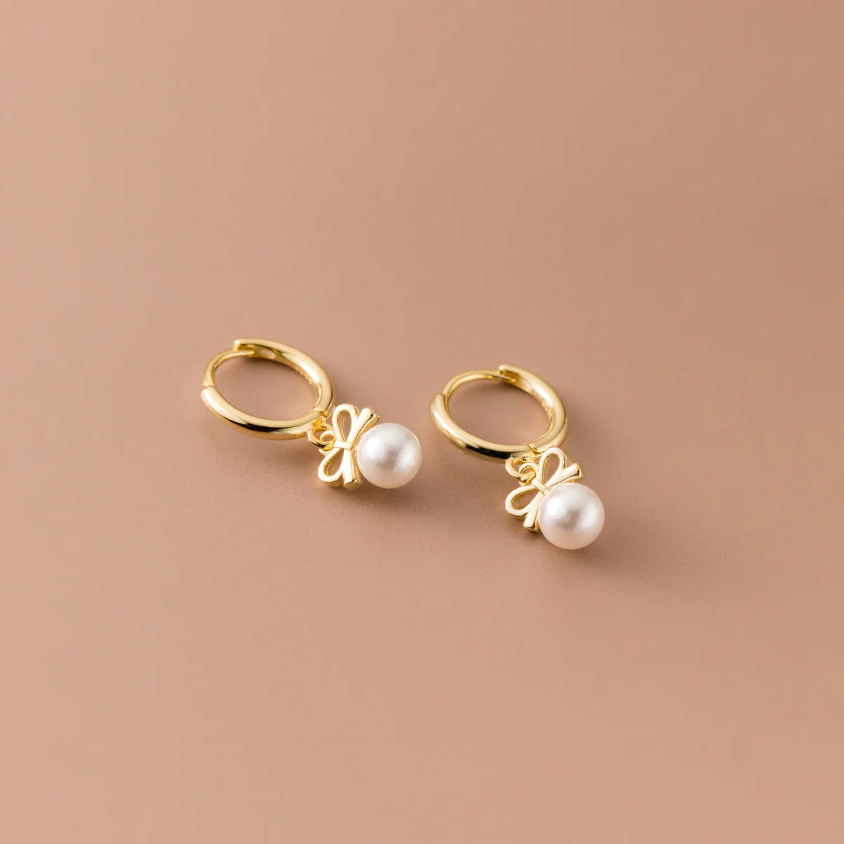 Elegant silver earrings with a Japanese and Korean-inspired butterfly design, made from premium S925 sterling silver