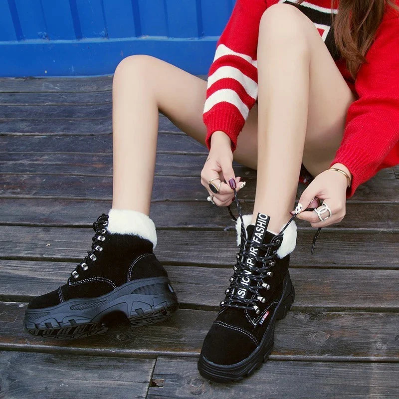 Stylish British platform boots with faux suede upper, lace-up closure, and wedge heel design