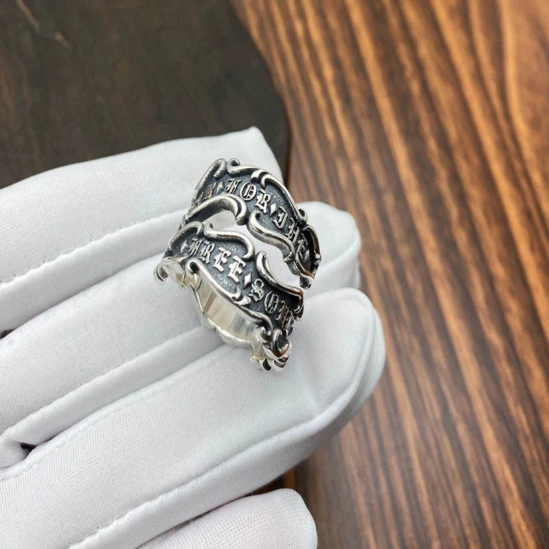 A personalized retro-style sterling silver ring with a ribbon design, made for men's fashion and accessory needs.