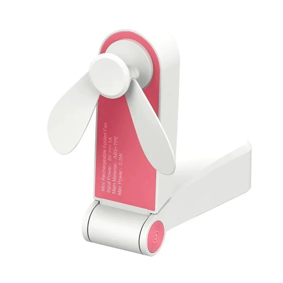 Compact rechargeable handheld fan in pink and green colours, providing powerful cooling on the move