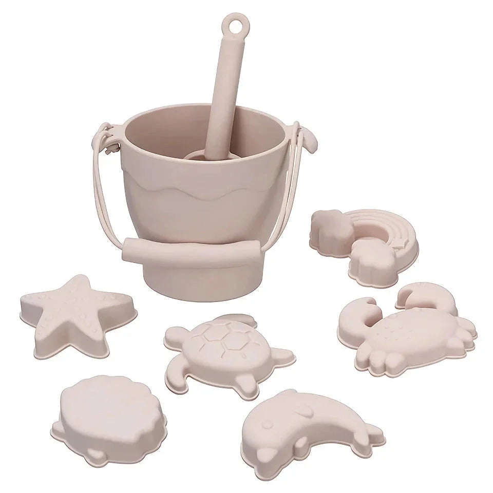 Premium eco-friendly silicone beach playset with bucket, spades, and themed molds for children's creative outdoor play