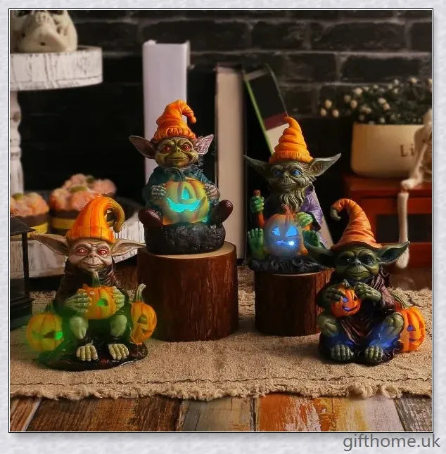 Eerie Halloween Resin Figurine with Glowing Pumpkin Lamp, a spooky and enchanting décor piece for your holiday celebrations