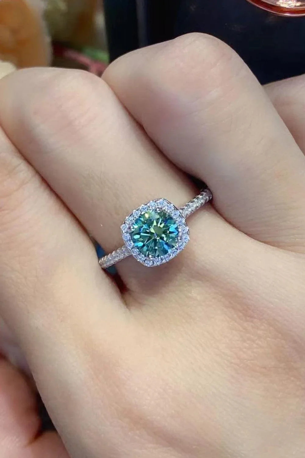 Sparkling 3 carat moissanite platinum-coated cluster ring with modern, minimalist design and polished finish