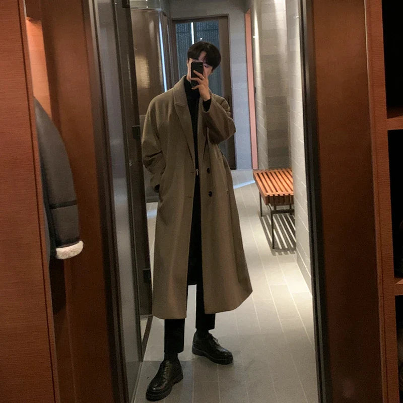 Premium British knee-length trench coat in classic black, featuring a relaxed, comfortable fit and made from a durable polyester-viscose blend.