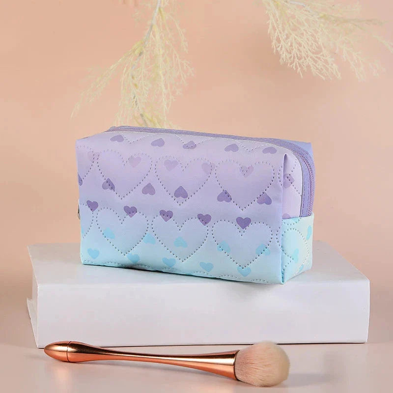 Stylish large-capacity waterproof cosmetic bag with heart pattern design, perfect for organising makeup, skincare, and travel essentials