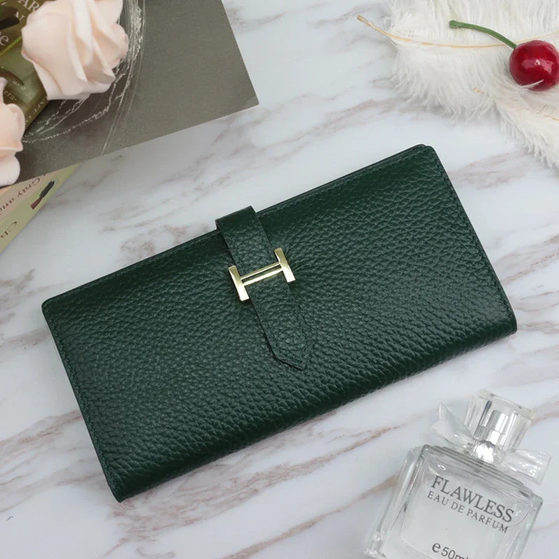 A stylish and practical long wallet made from premium leather, featuring a convenient drawstring closure to keep your essentials organised and secure.