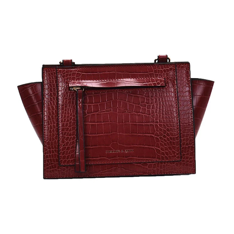 Premium British-designed messenger bag in wine red colour, featuring a spacious and stylish design with a single strap for comfortable carrying.