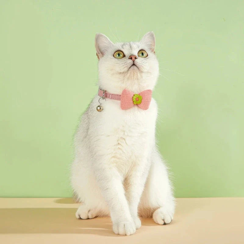 Stylish checkered pet collar with elegant butterfly knot decoration, perfect for dressing up cats and dogs