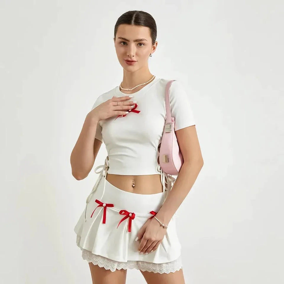 Elegant white lace 2-piece summer set with bow bandage cutout T-shirt and elastic mini skirt