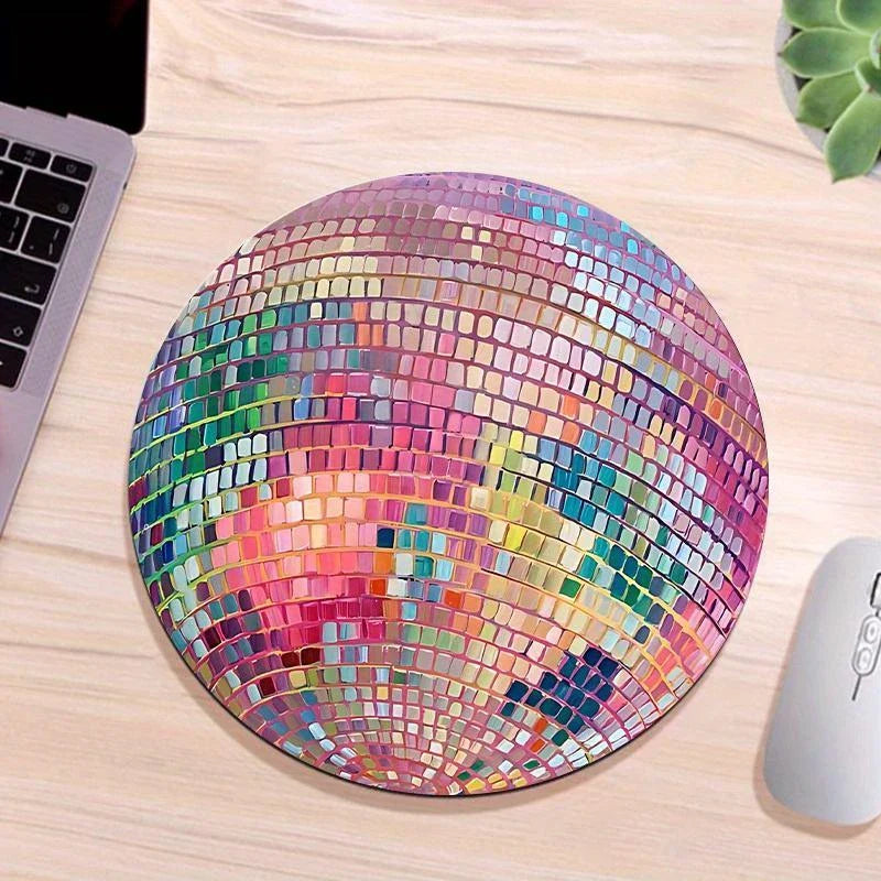 Vibrant pink disco ball pattern mouse pad for a stylish and functional desk accessory