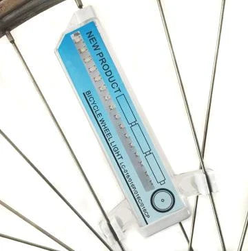 Bicycle Wheel Flashing Light with 32 LED lights in red, blue, and green colours that create a mesmerizing light show