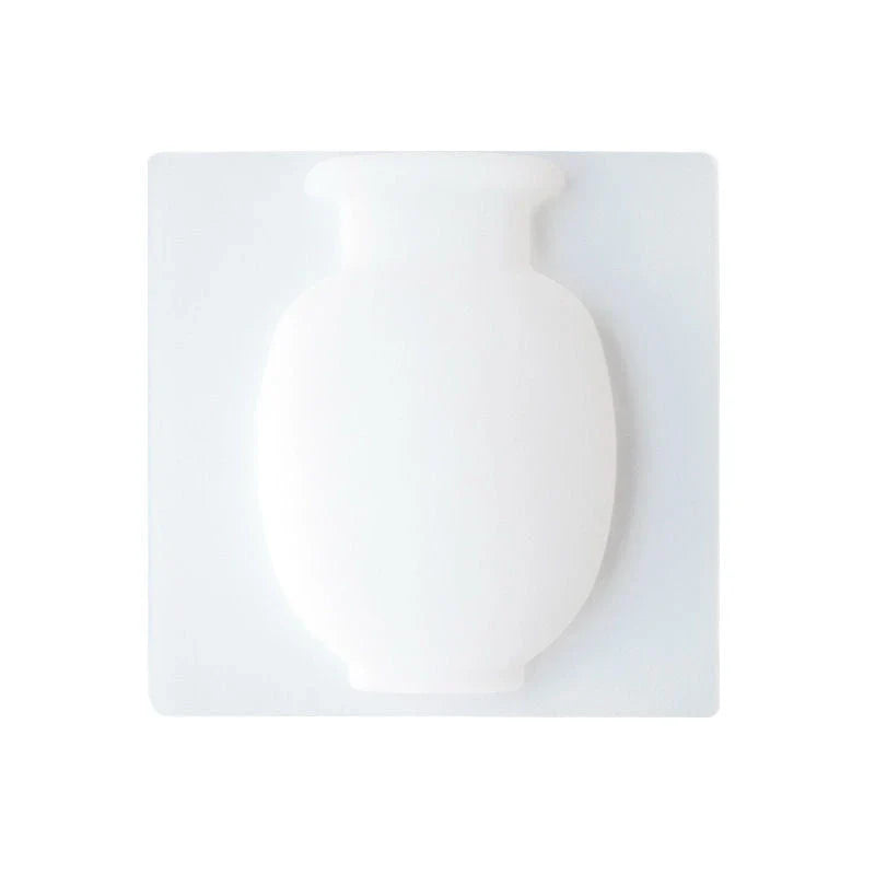 Silicone suction cup wall vase in pink colour, perfect for decorating UK homes