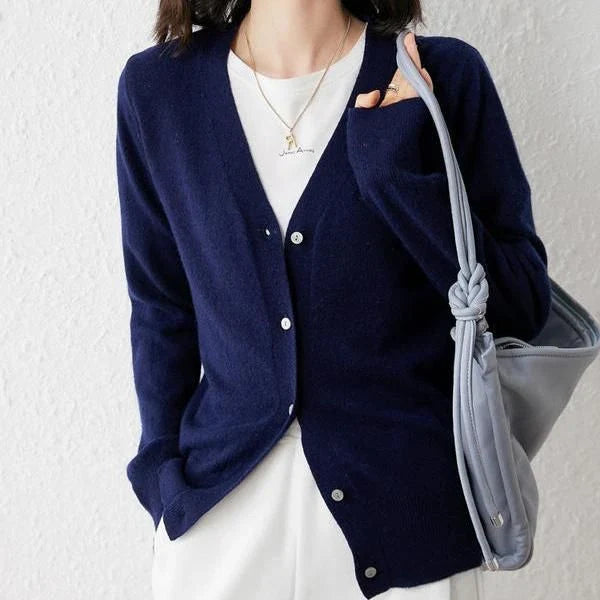 Chic v-neck single breasted cardigan in blue, green, and pink colours with a sophisticated and timeless design