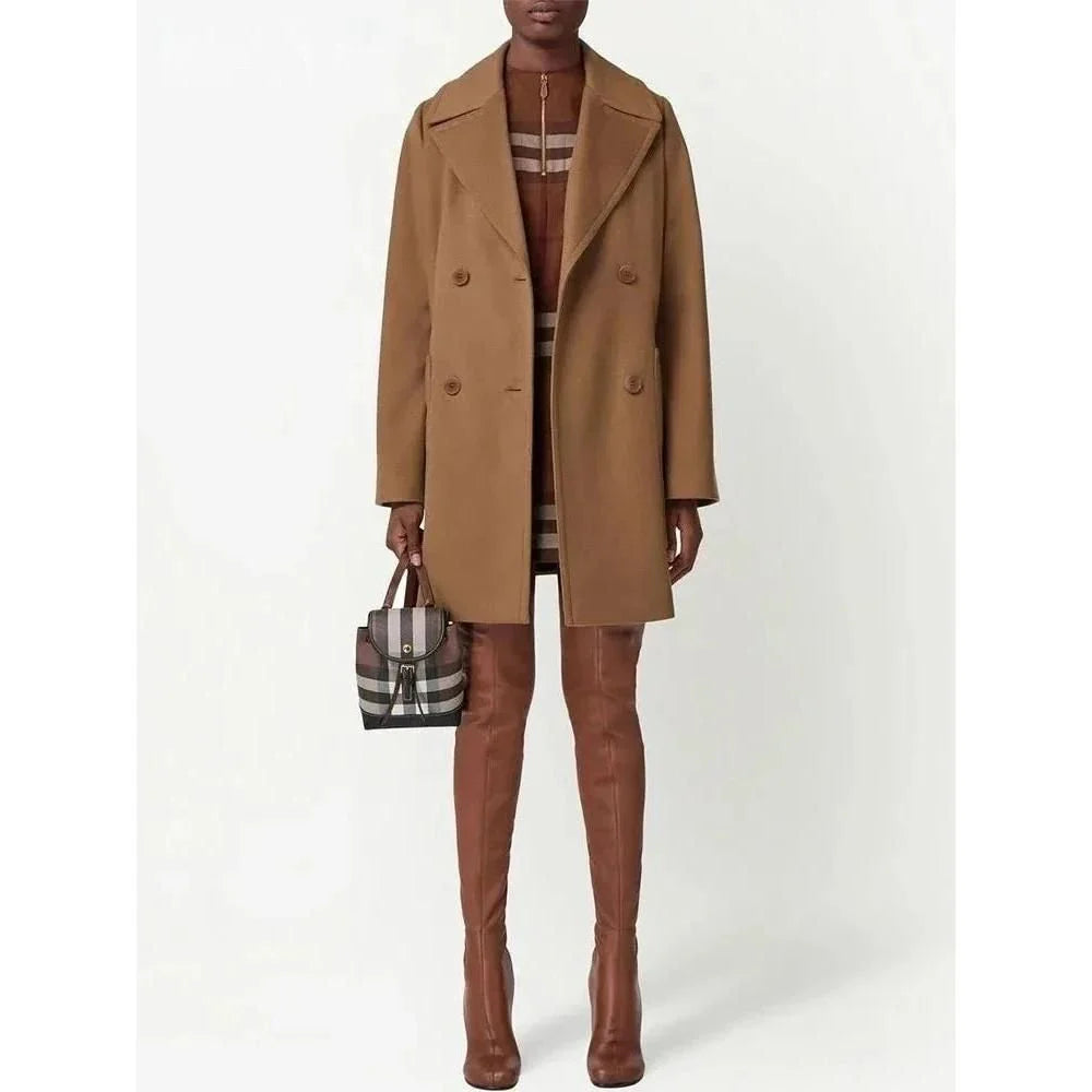 A stylish mid-length double-breasted overcoat made from a warm, durable wool and polyester blend fabric