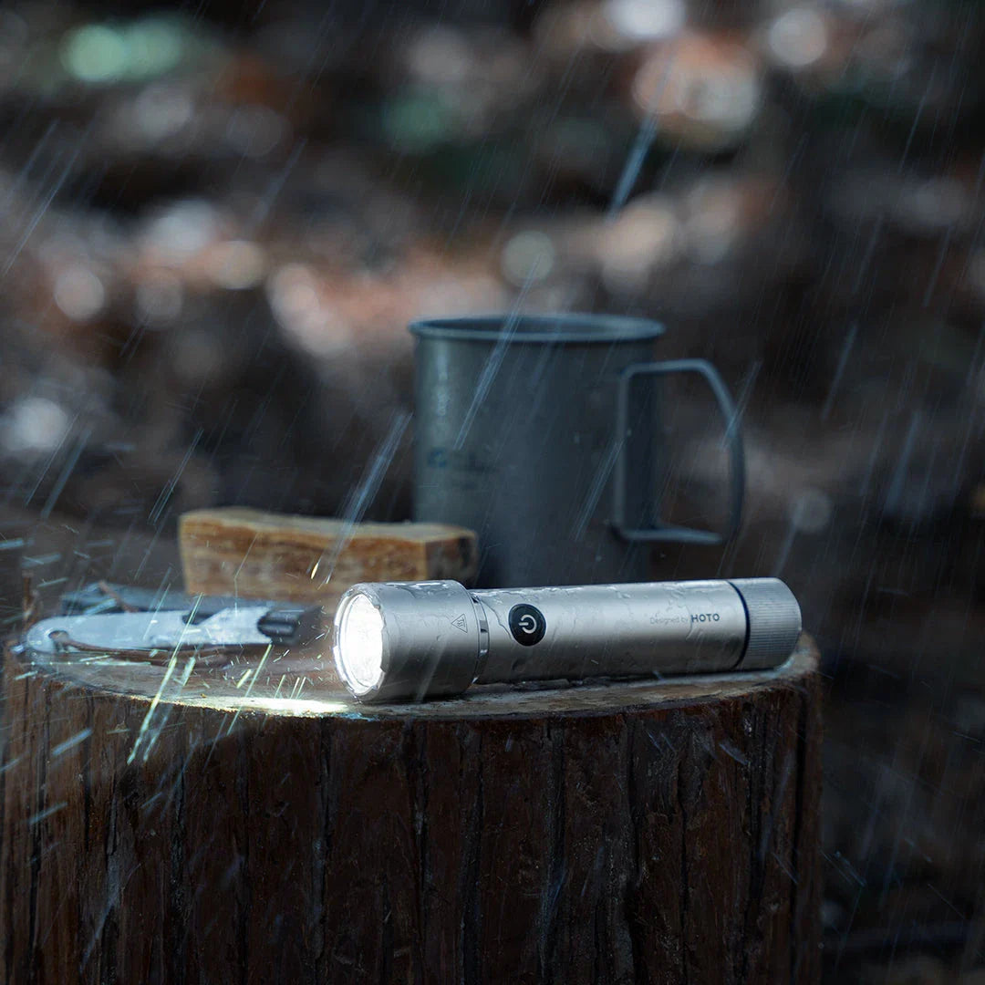 Powerful 2300 lumens tactical flashlight with durable aluminium alloy construction, waterproof design, and versatile functionality for outdoor activities and self-defence.